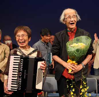 （写真）岡田京子さん・安達元彦さん